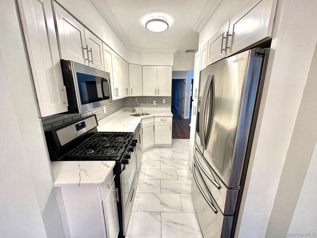 8577 66th Avenue, Rego Park, NY 11374