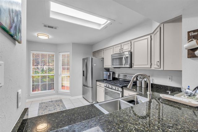 62 Laughing Brook Court, Spring, TX 77380