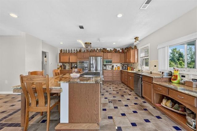 26025 Metcalf Road, Louisburg, KS 66053