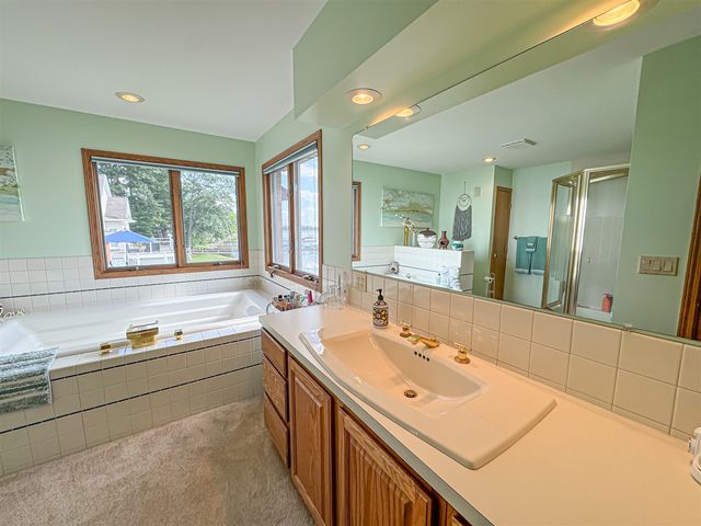 815 E Lake Mitchell Drive, Cadillac, MI 49601