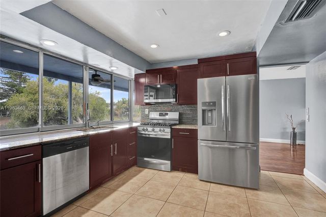 8699 NW 26th Pl, Sunrise, FL 33322