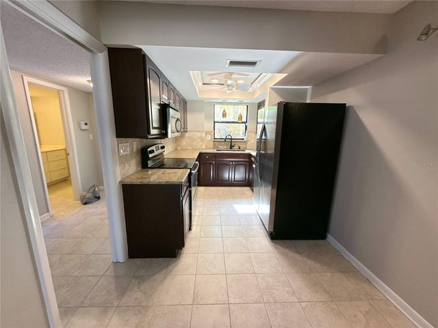 13516 PALMWOOD LANE, Tampa, FL 33618