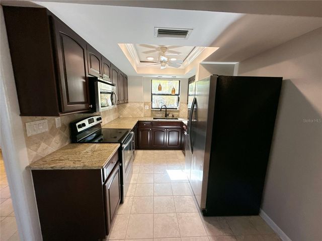 13516 PALMWOOD LANE, Tampa, FL 33618