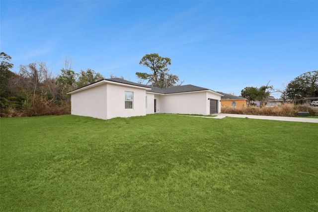 1523 ZINNIA DRIVE, Deltona, FL 32725