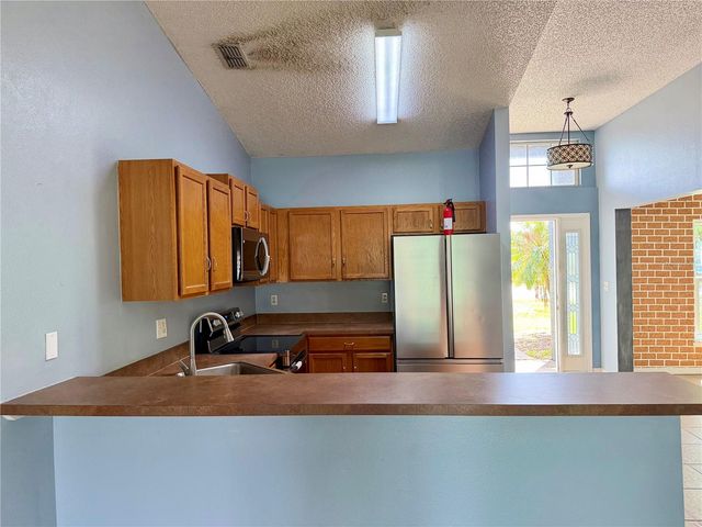 1453 WHOOPING DRIVE, Groveland, FL 34736