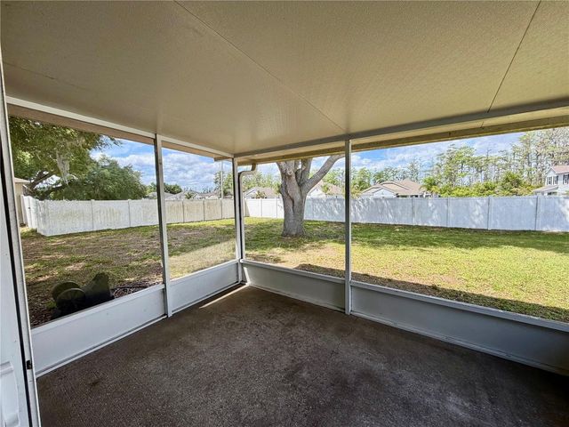 1453 WHOOPING DRIVE, Groveland, FL 34736