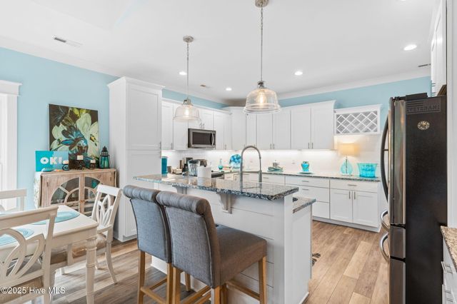 205 NE 59th Street, Oak Island, NC 28465