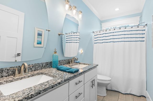 205 NE 59th Street, Oak Island, NC 28465