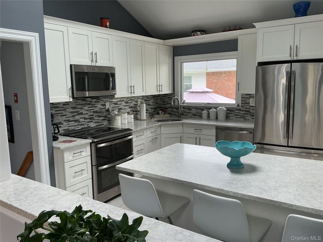 909 Berkshire Drive, Westbury, NY 11590