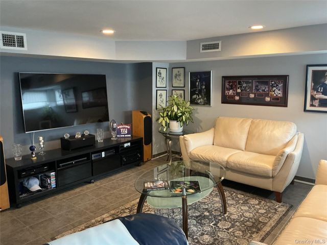 909 Berkshire Drive, Westbury, NY 11590