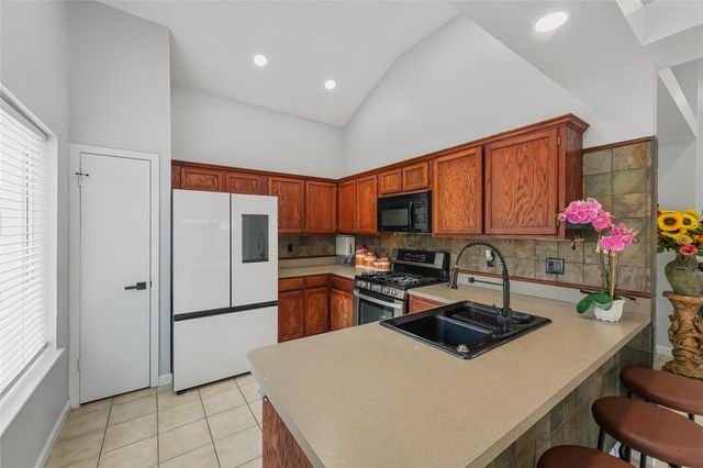 6703 Dewcrest Drive, Katy, TX 77449