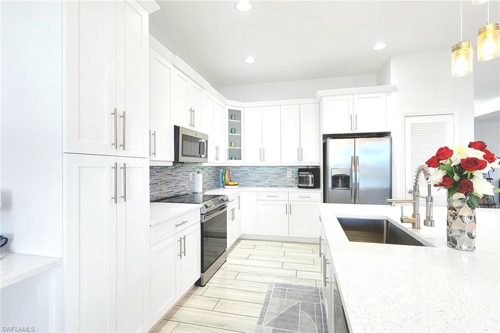 Image 3 of property listing at 2675 Blue Cypress Lake CT, Cape Coral, FL 33909