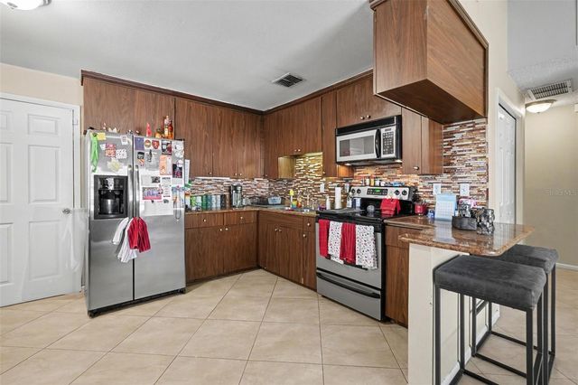 412 W IDLEWILD AVENUE, Tampa, FL 33604