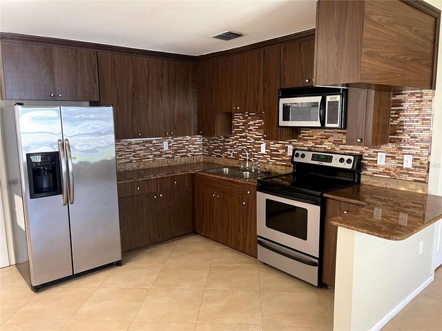 412 W IDLEWILD AVENUE, Tampa, FL 33604