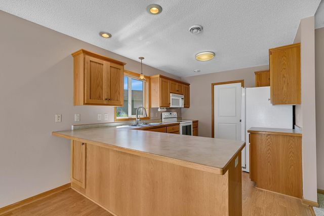 1165 Willow Run Court, Waite Park, MN 56387