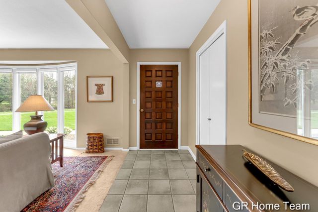 867 Cramton Avenue NE, Ada, MI 49301