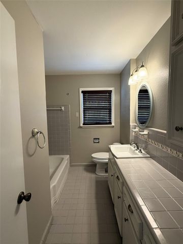 9646 Meadowglen Lane, Houston, TX 77063