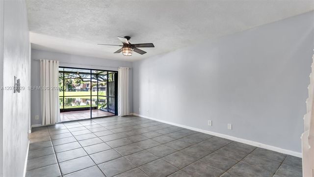 11112 N Harmony Lake Circle, Davie, FL 33324