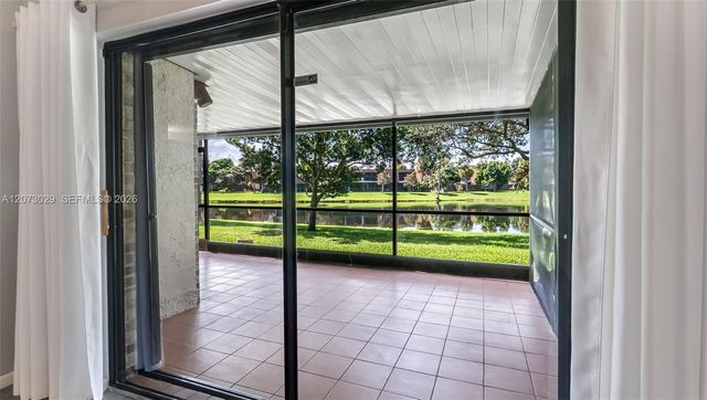 11112 N Harmony Lake Circle, Davie, FL 33324