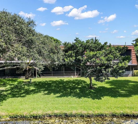 11112 N Harmony Lake Circle, Davie, FL 33324