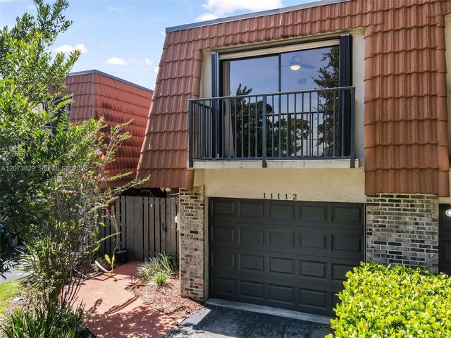 11112 N Harmony Lake Circle, Davie, FL 33324