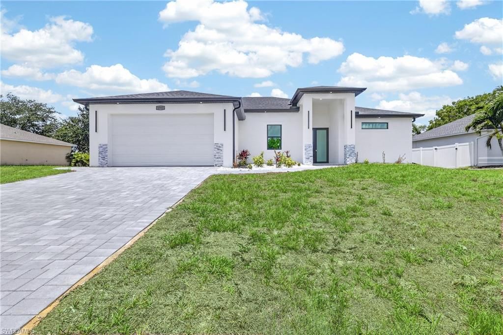 Image 2 of property listing at 1312 NE 5TH AVE, Cape Coral, FL 33909
