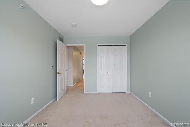 160 Club House Circle 57, Walled Lake, MI 48390