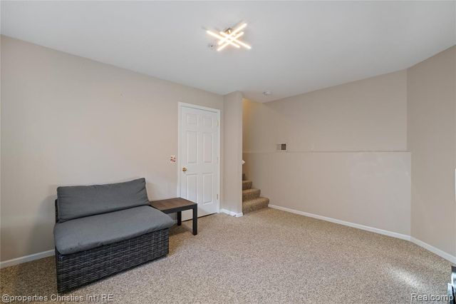 160 Club House Circle 57, Walled Lake, MI 48390