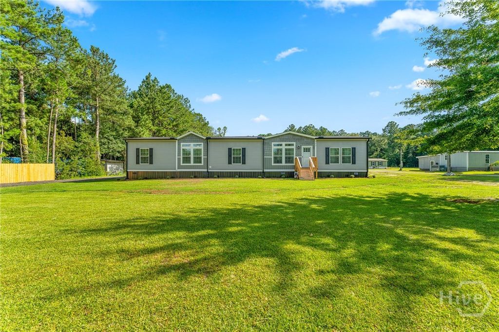 Image 1 of property listing at 302 Middleton Road, Guyton, GA 31312