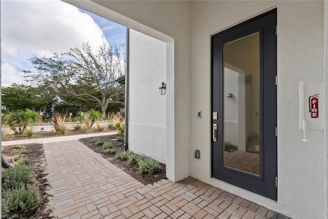16889 Fairgrove Way Unit 201, Naples, FL 34110