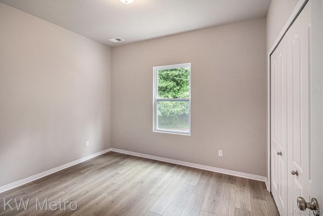 215 Whispering Pines Drive 12, Fenton, MI 48430