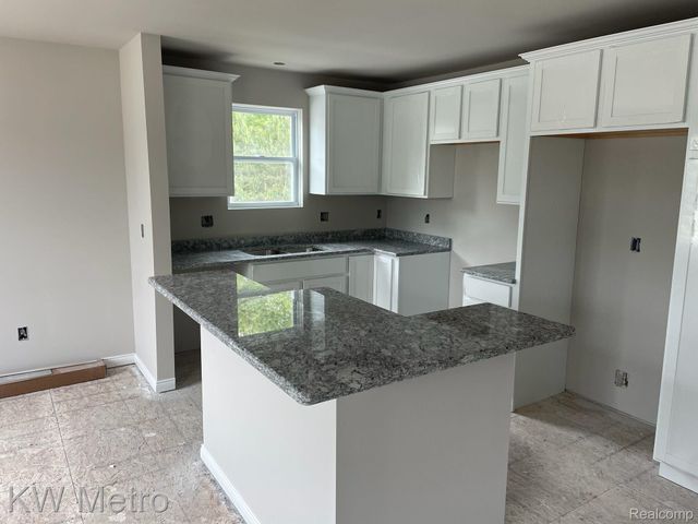215 Whispering Pines Drive 12, Fenton, MI 48430