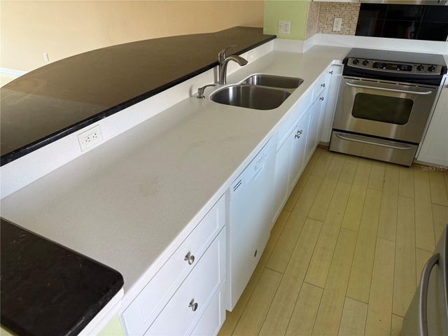 1250 N PORTOFINO DRIVE 202, Sarasota, FL 34242