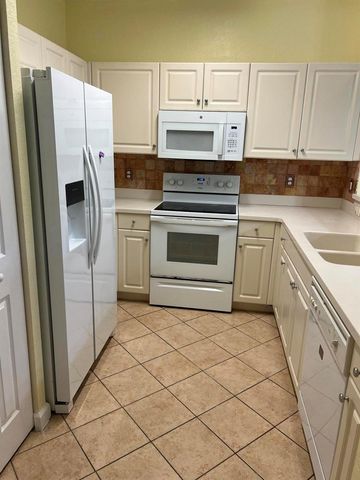 4113 NAPOLI LAKE Drive, Riviera Beach, FL 33410