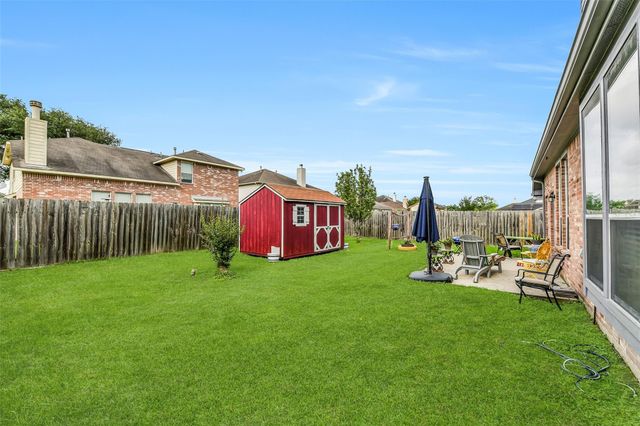 8002 Leaning Oak Drive, Texas City, TX 77591