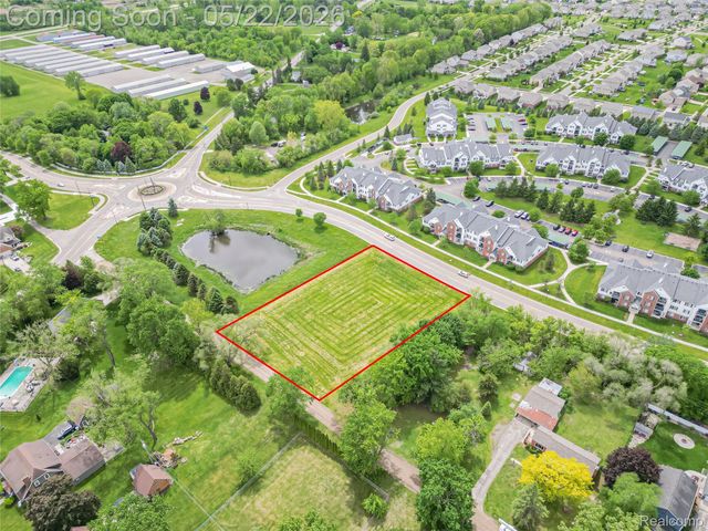 57735 New Hudson Drive, Lyon Charter Township, MI 48165
