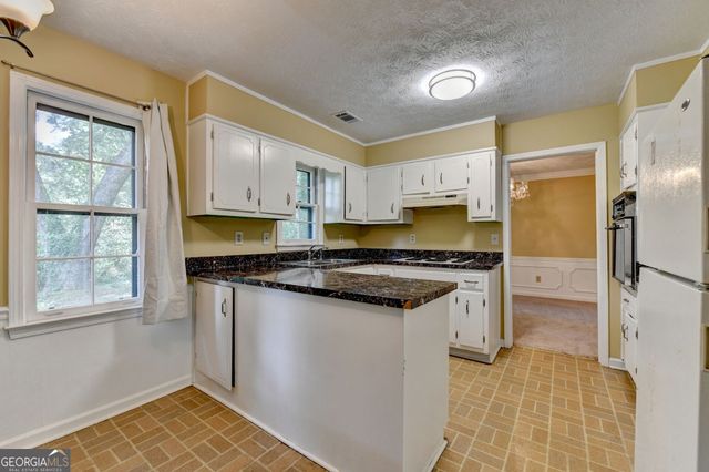 567 Planters Row SW, Lilburn, GA 30047