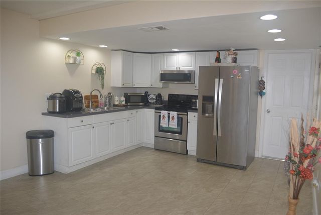 1410 ALWYNNE DRIVE, Lehigh Acres, FL 33936