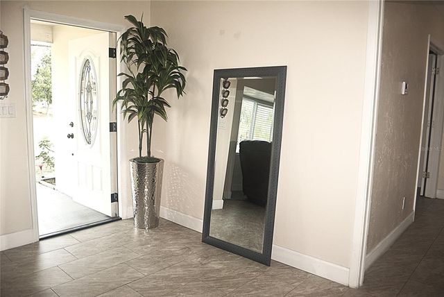 1410 ALWYNNE DRIVE, Lehigh Acres, FL 33936