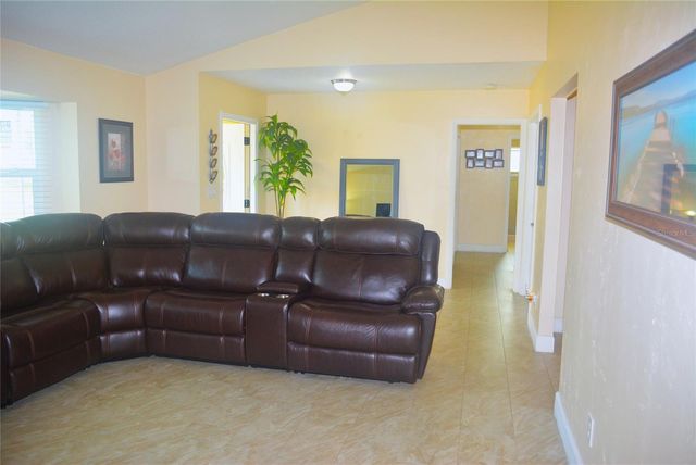 1410 ALWYNNE DRIVE, Lehigh Acres, FL 33936