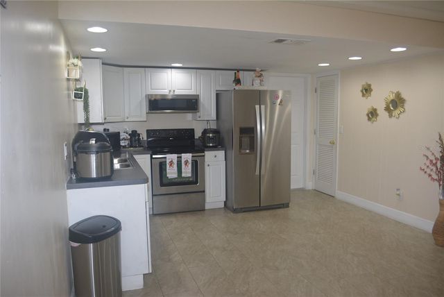 1410 ALWYNNE DRIVE, Lehigh Acres, FL 33936