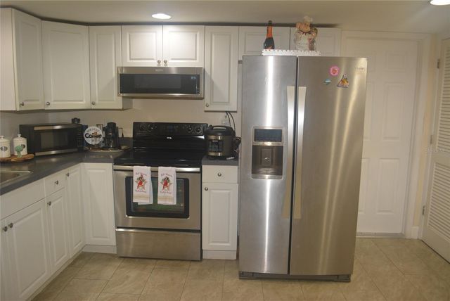 1410 ALWYNNE DRIVE, Lehigh Acres, FL 33936