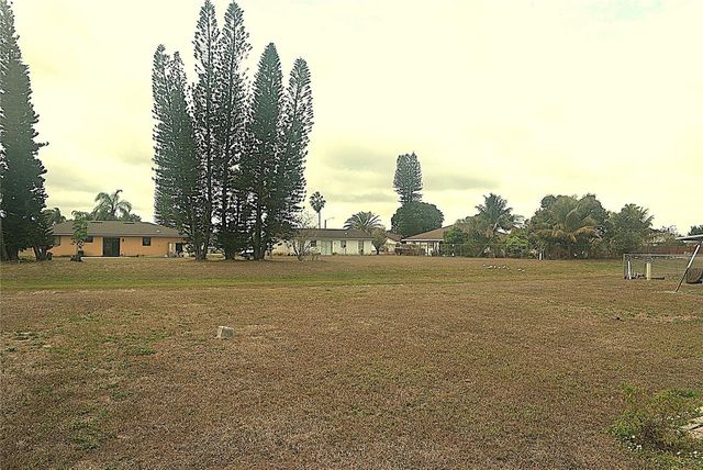 1410 ALWYNNE DRIVE, Lehigh Acres, FL 33936