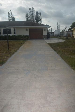 1410 ALWYNNE DRIVE, Lehigh Acres, FL 33936