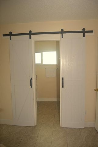 1410 ALWYNNE DRIVE, Lehigh Acres, FL 33936