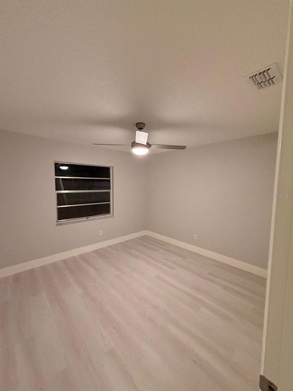 Image 27 of property listing at 12216 FLORIDA WOODS LANE, Orlando, FL 32824