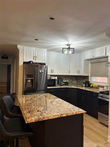 10144 98th Street, Ozone Park, NY 11416