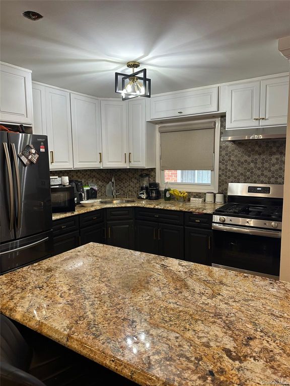 10144 98th Street, Ozone Park, NY 11416