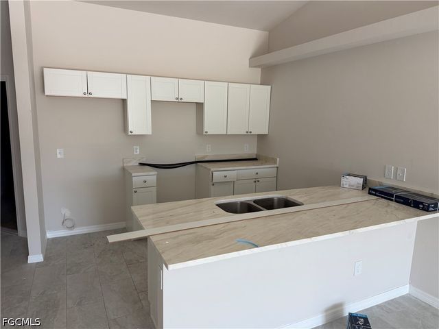 703 SE 8th ST, Cape Coral, FL 33990
