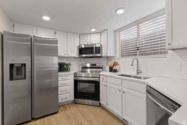 1310 W COUNTRYWOOD LN, West Jordan, UT 84088